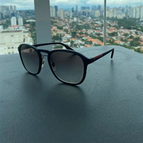 oculos prada masculino usado